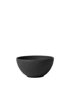 A round small black bowl with a slate stone texture
